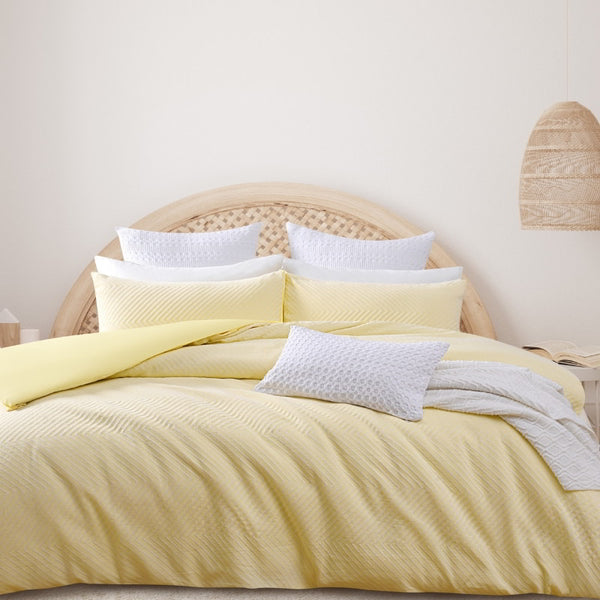 alt="Soft and gentle quilt cover set captivating textured geometric design to transform your bedroom"