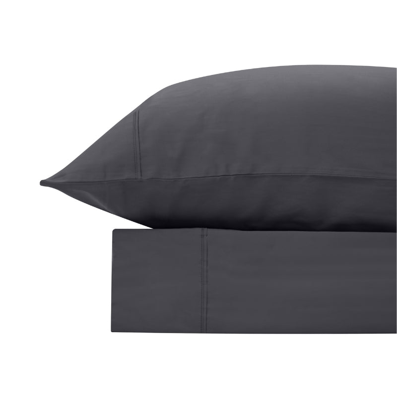 alt="A charcoal bamboo cotton sheet set featuring its minimal, inviting softness and comfort"