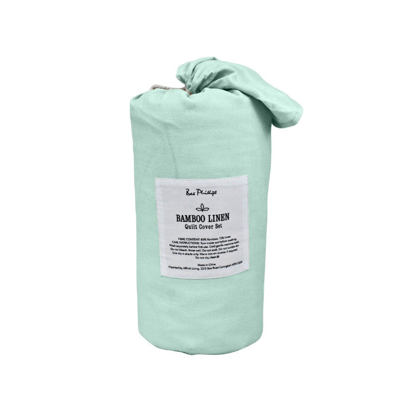 alt="Back details of a nice packaging of a mint quilt cover to your bedroom"