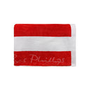 Close up details of Cabana red beach towel showcasing a soft and absorbent cotton that is ideal for seaside relaxation.