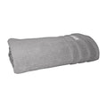 alt="Side zoom details of pebble Bath towel featuring its finest Egyptian cotton and high level of softness."