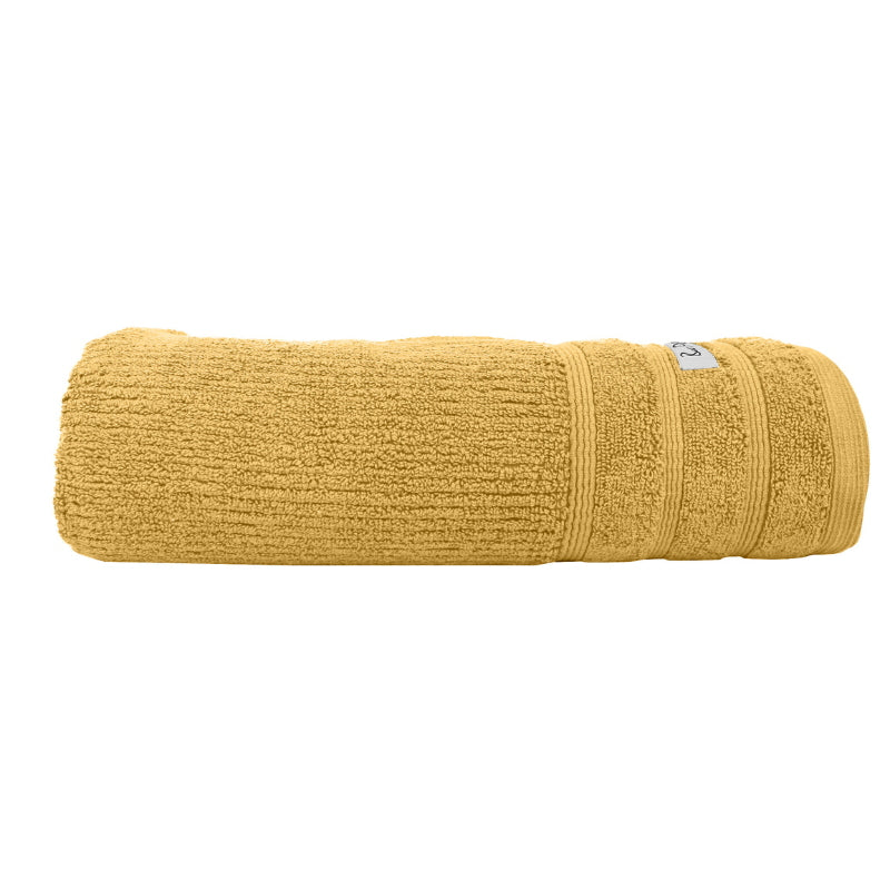 alt="Zoom in details of sunshine Bath towel featuring its finest Egyptian cotton and high level of softness."