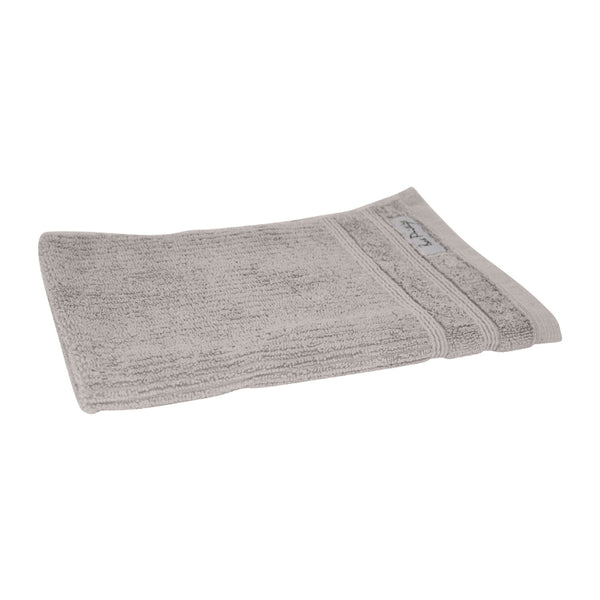 alt="An elegantly folded premium brown hand towel, showcasing its minimal and soft details"