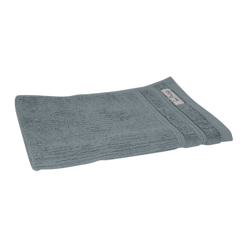 alt="An elegantly folded premium grey hand towel, showcasing its minimal and soft details"