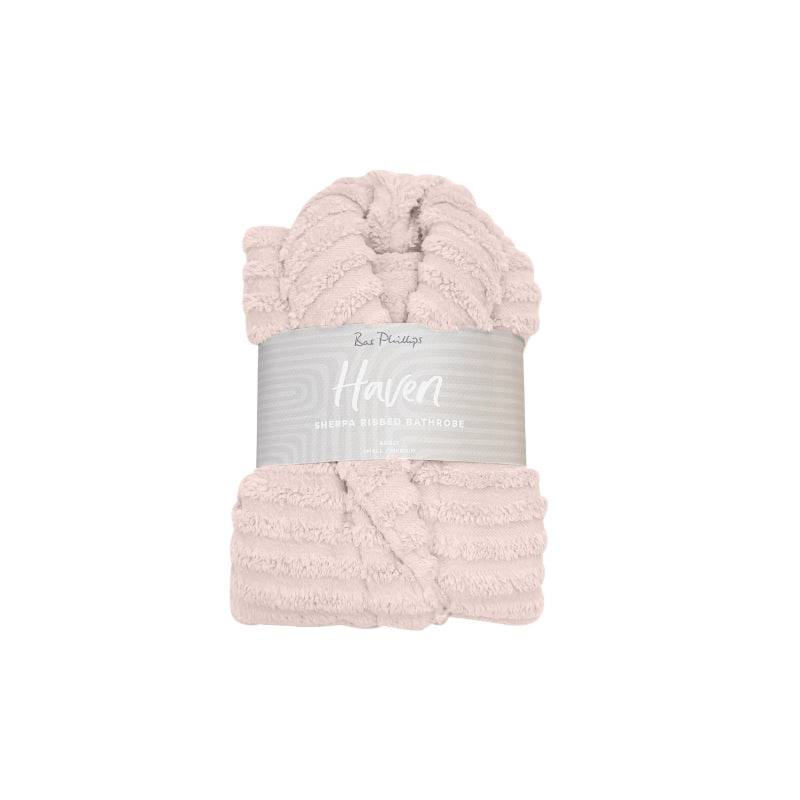 Packaging details of the pink Bas Phillips Haven Sherpa Ribbed Bathrobe which is a cloud-soft hug that offers ultimate comfort and stylish relaxation.