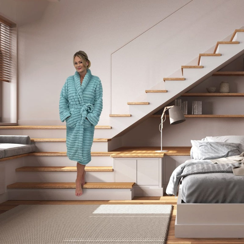 The blue Bas Phillips Haven Sherpa Ribbed Bathrobe envelops you in cloud-like softness, merging supreme comfort with a touch of style for relaxed elegance.
