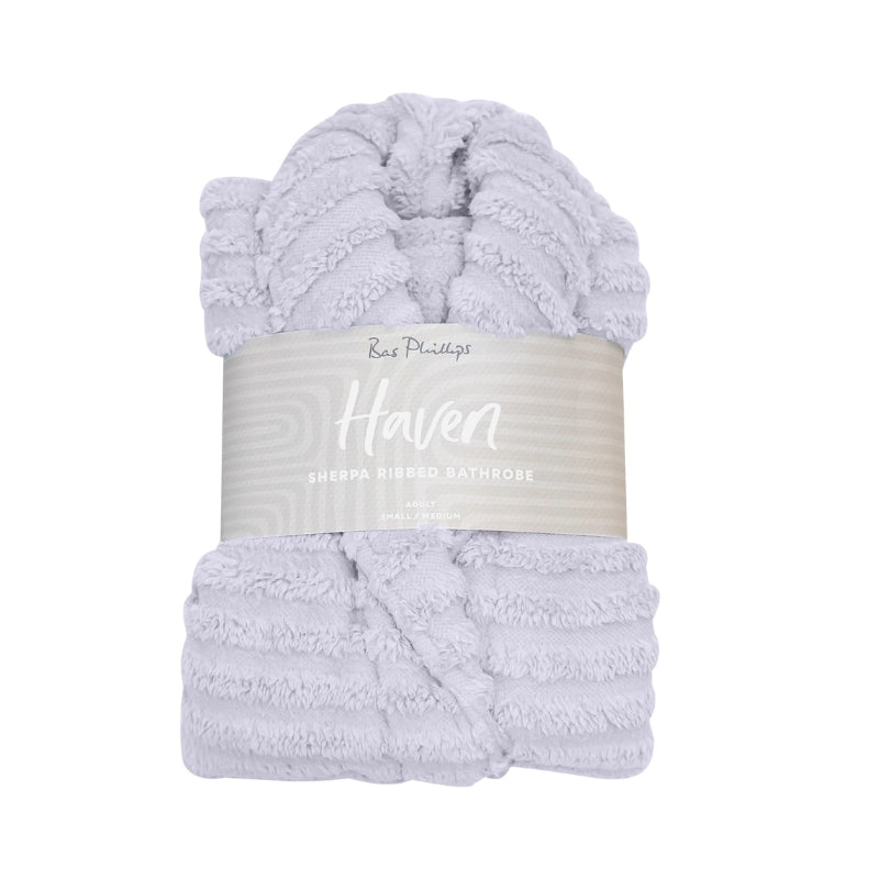 Packaging details of the purple Bas Phillips Haven Sherpa Ribbed Bathrobe which is a cloud-soft hug that offers ultimate comfort and stylish relaxation.