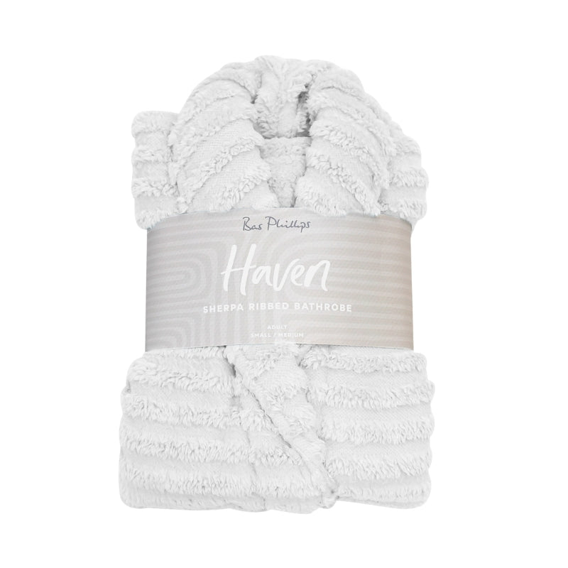 Packaging details of the white bathrobe which is a cloud-soft hug that offers ultimate comfort and stylish relaxation.
