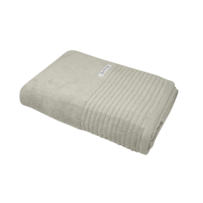 alt="Folded front details of oatmeal bath sheets featuring its softness and high quality cotton."
