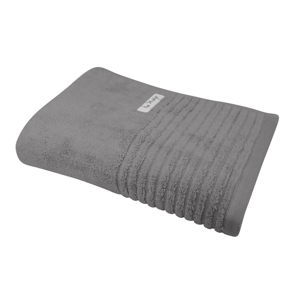 alt="A full photo details of a neatly folded cobblestone hayman bath towel showcasing its premium-quality zero twist cotton and inviting softness"