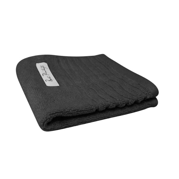 alt="A folded details of an eclipse hayman zero twist cotton face washer featuring its minimal and soft details"