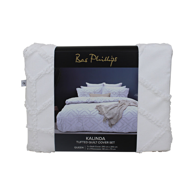 alt="Front details of a luxurious quilt cover set in a white hue features a captivating geometric design"