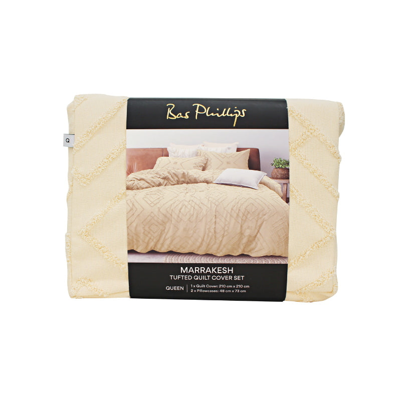 alt="Front details of a nice package of luxurious quilt cover set features a Morrocan inspired geometric pattern with tufted details"