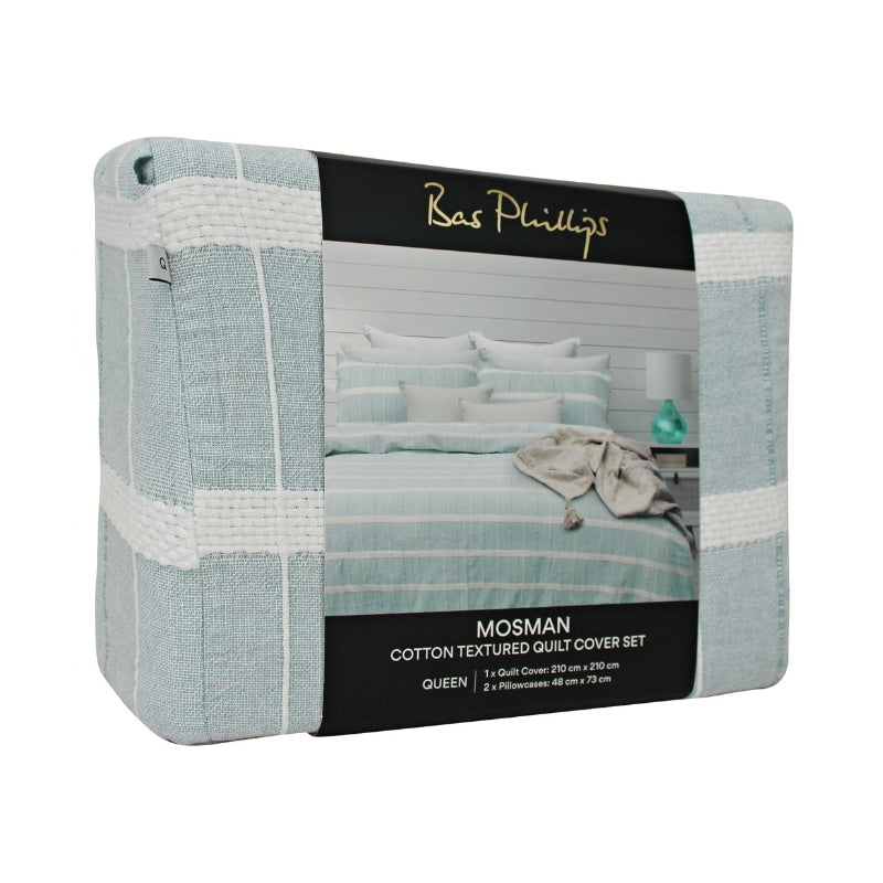alt="Side details of a nice package of a luxurious quilt cover set in a blue hue feature an exquisite textured design."