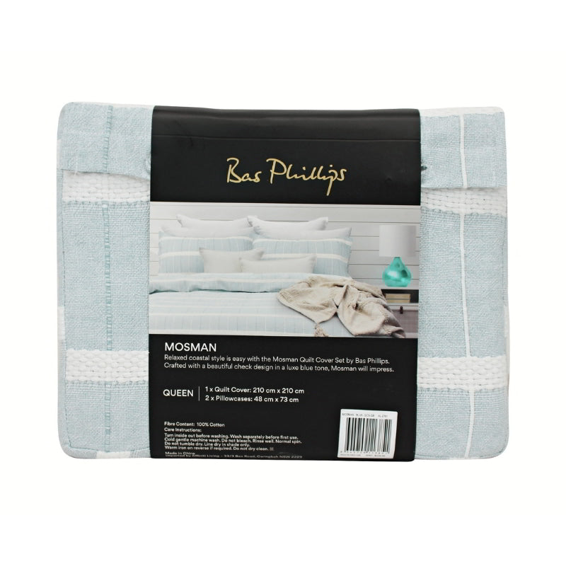 alt="Back details of a nice package of a luxurious quilt cover set in a blue hue feature an exquisite textured design."