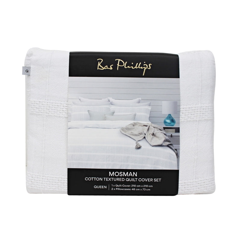 alt="Front details of a nice package of a luxurious quilt cover set in a white hue feature an exquisite textured design."
