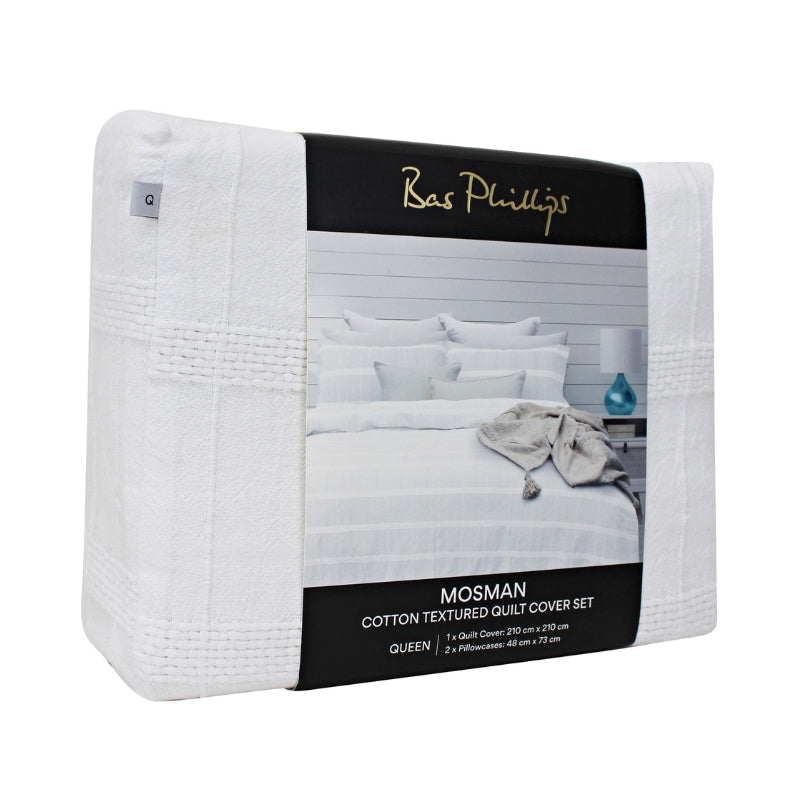alt="Side details of a nice package of a luxurious quilt cover set in a white hue feature an exquisite textured design."