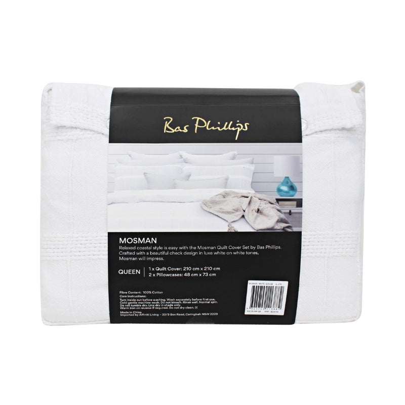 alt="Back details of a nice package of a luxurious quilt cover set in a white hue feature an exquisite textured design."