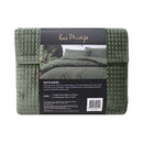 alt="Back details of a nice package of lluxurious quilt cover set in a green hue will add cosiness to your bedroom."