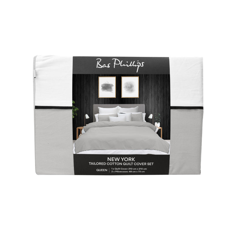 alt="Front details of a nice package of soft pure cotton quilt cover set in light grey and white hues featuring an elegant border details"