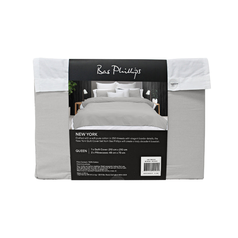 alt="Back details of a nice package of soft pure cotton quilt cover set in light grey and white hues featuring an elegant border details"