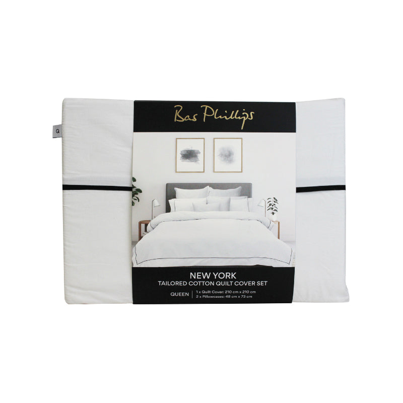 alt="Front details of a nice package of soft pure cotton quilt cover set in white hue featuring an elegant border details"
