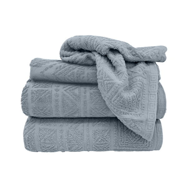 alt="Neatly folded persia 4 pack towels in light blue colour featuring its premium-quality jacquard cotton and stunning design"