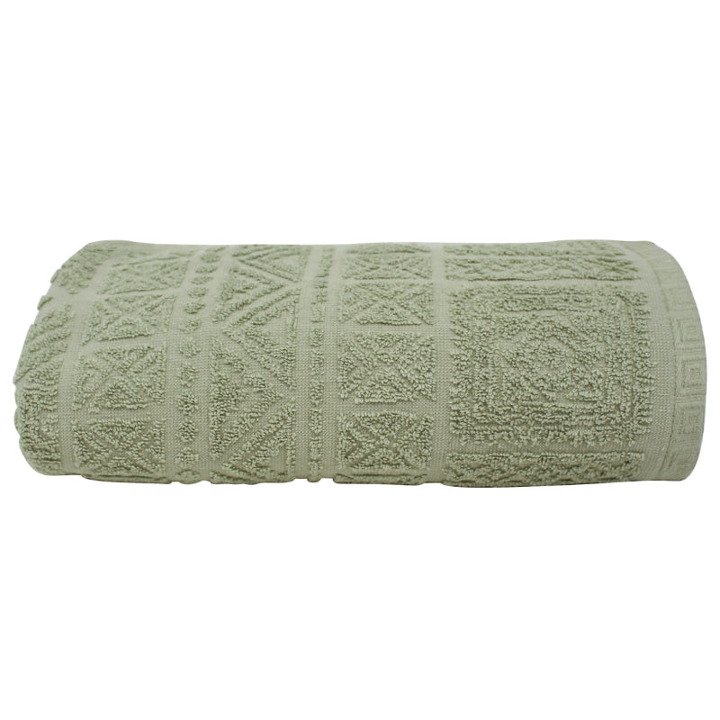 alt="A zoom-in photo of a neatly folded sage persia bath towel showcasing its luxurious design"