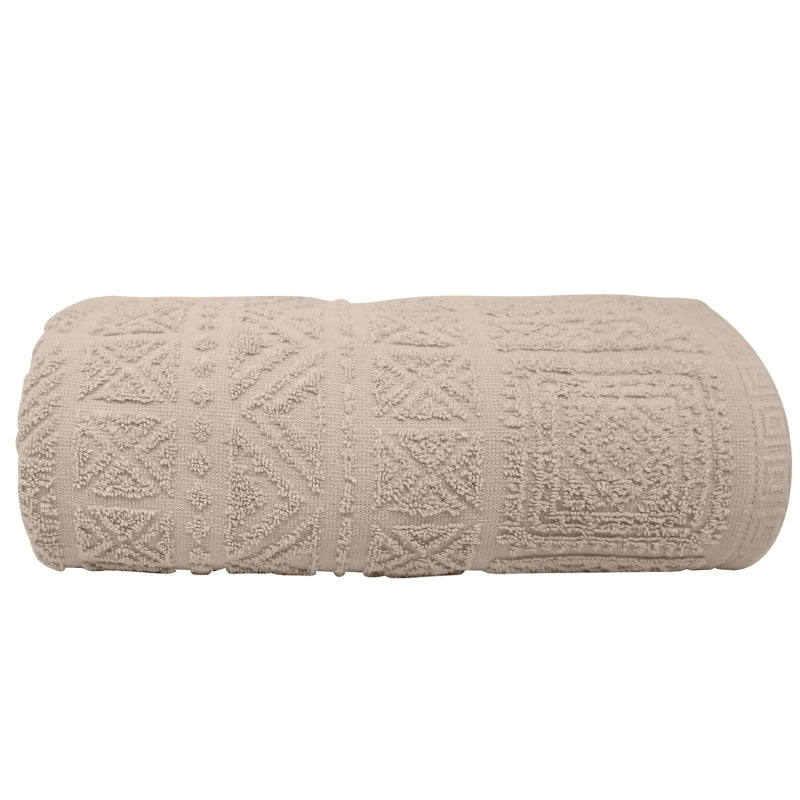  alt="A photo of a neatly rolled linen persia bath towel showcasing its luxurious details"