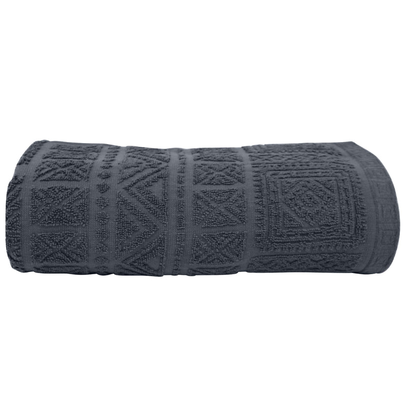 alt="A zoom-in photo of a neatly rolled charcoal persia bath towel showcasing its luxurious design"