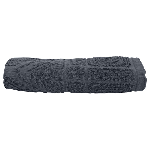 alt="A neatly folded, premium charcoal hand towel showcasing its minimalistic design and inviting softness."