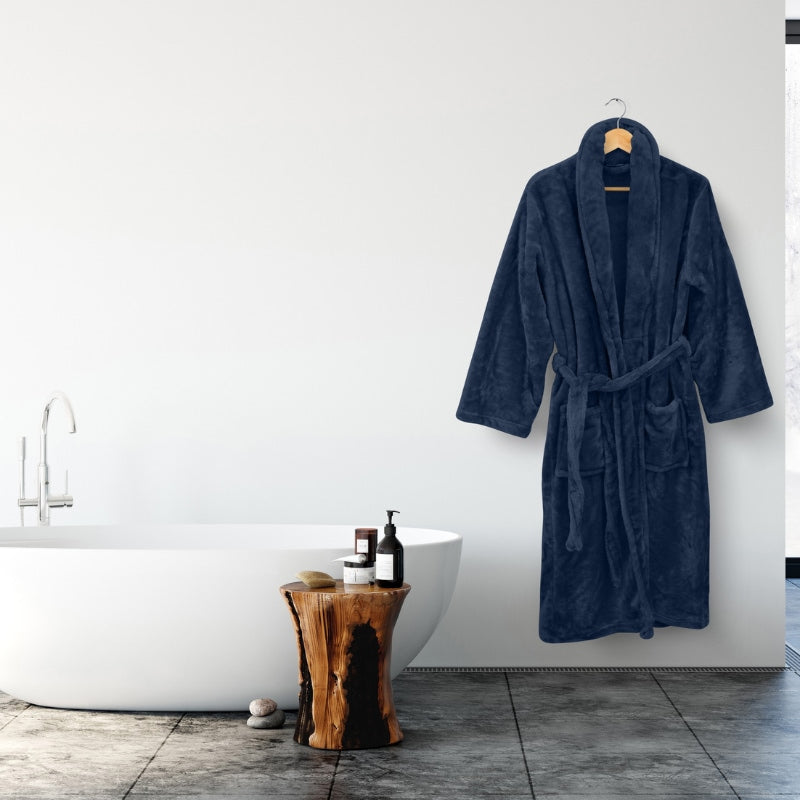 Indulge in the navy blue Bas Phillips Silk Touch Bathrobe's ultimate softness and classic charm with a snug collar, tie belt, and sizes from S to XL for a blissful at-home spa.
