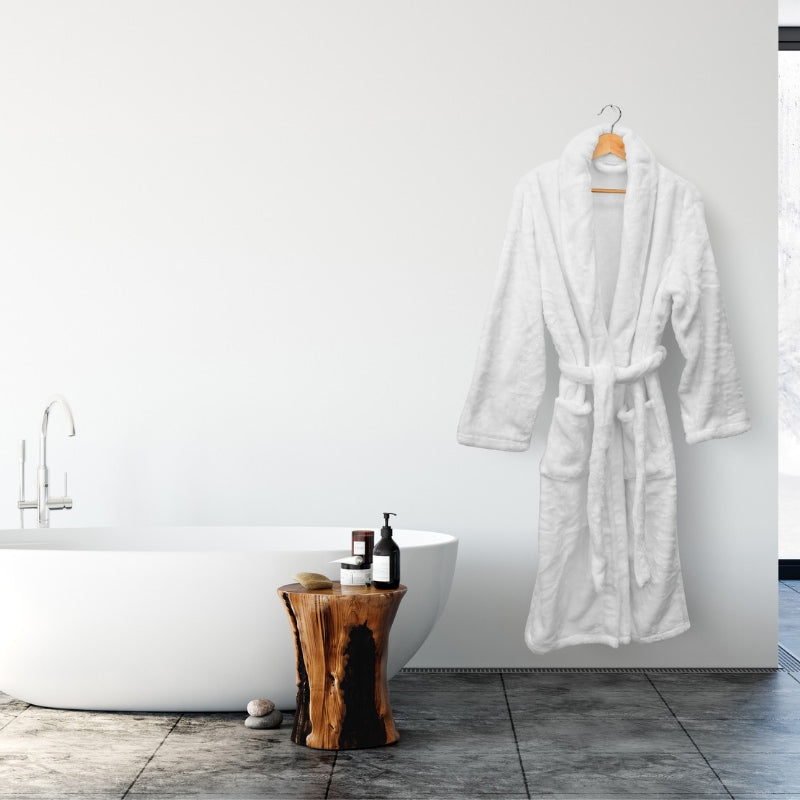 Indulge in the white Bas Phillips Silk Touch Bathrobe's ultimate softness and classic charm with a snug collar, tie belt, and sizes from S to XL for a blissful at-home spa.