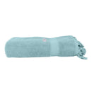 alt="A neatly rolled Torquay Towel towel in cloud blue colour showcasing its luxurious details and premium-quality cotton"