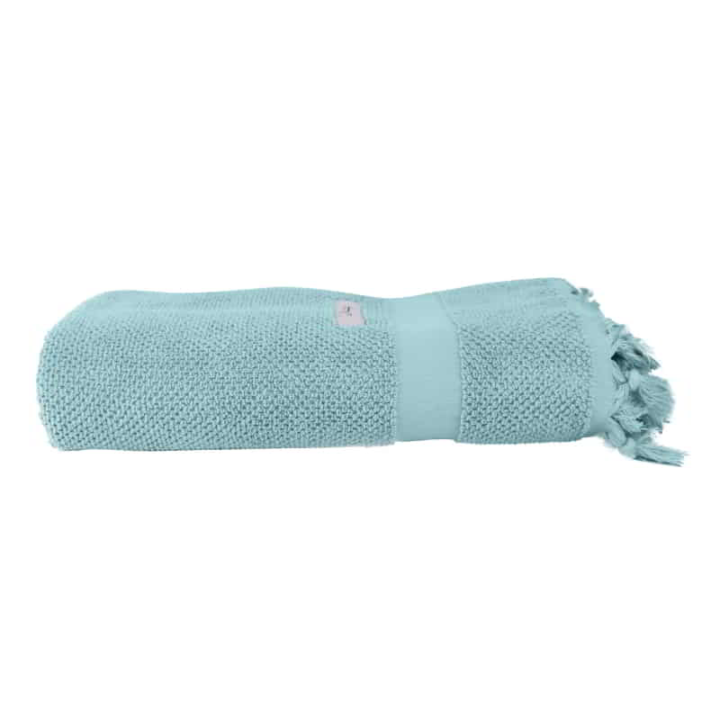 alt="A neatly rolled Torquay Towel towel in cloud blue colour showcasing its luxurious details and premium-quality cotton"
