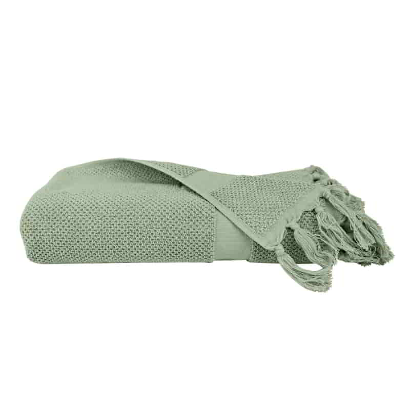 alt="A neatly rolled Sage Torquay Towel showcasing its luxurious details and premium-quality cotton"