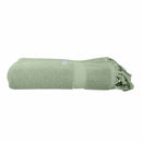 alt="A neatly rolled Sage Torquay Towel showcasing its luxurious details and premium-quality cotton"