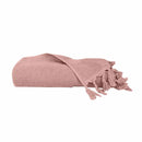 alt="A neatly rolled Dusty Pink Torquay Towel showcasing its luxurious details and premium-quality cotton"