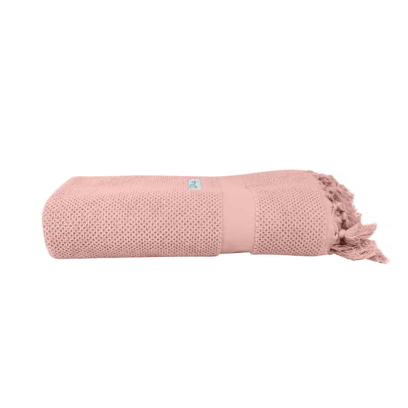 alt="A neatly rolled Dusty Pink Torquay Towel showcasing its luxurious details and premium-quality cotton"