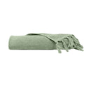 alt="An elegantly folded green hand towel, showcasing its minimal and soft details"