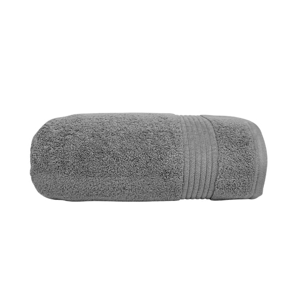 alt="A neatly rolled cloud valencia zero twist towel featuring its soft and intricate details."