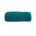 alt="Zoom in details of teal Bath towel featuring its premium-quality cotton and high level of softness."