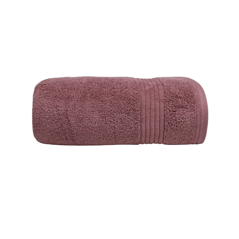 alt="Zoom in details of dusty rose Bath towel featuring its premium-quality cotton and high level of softness."