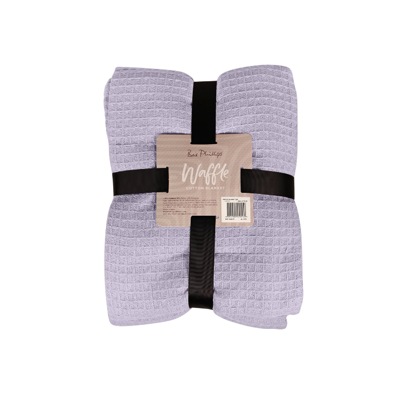 Packaging details of a lilac Cotton Blanket featuring its luxuriously soft and resilient Cotton with added polyester.