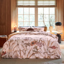 Full bed view of the Cely Multi Quilt Cover with camel reverse and coordinating pillowcases
