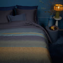 Flat lay of the Lenny Blue quilt fabric showing colour shift and fine detailing