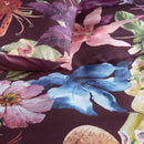 Close-up of floral pattern on the quilt cover showing pink and blue flower details
