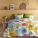 Bedding House Lotti Multi Quilt Cover styled in a colourful floral bedroom setting