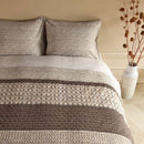 Hand-drawn textured design detail on Mathis Natural Quilt Cover fabric

