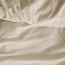 Close-up of the natural wrinkled texture of the Summer Seersucker quilt cover